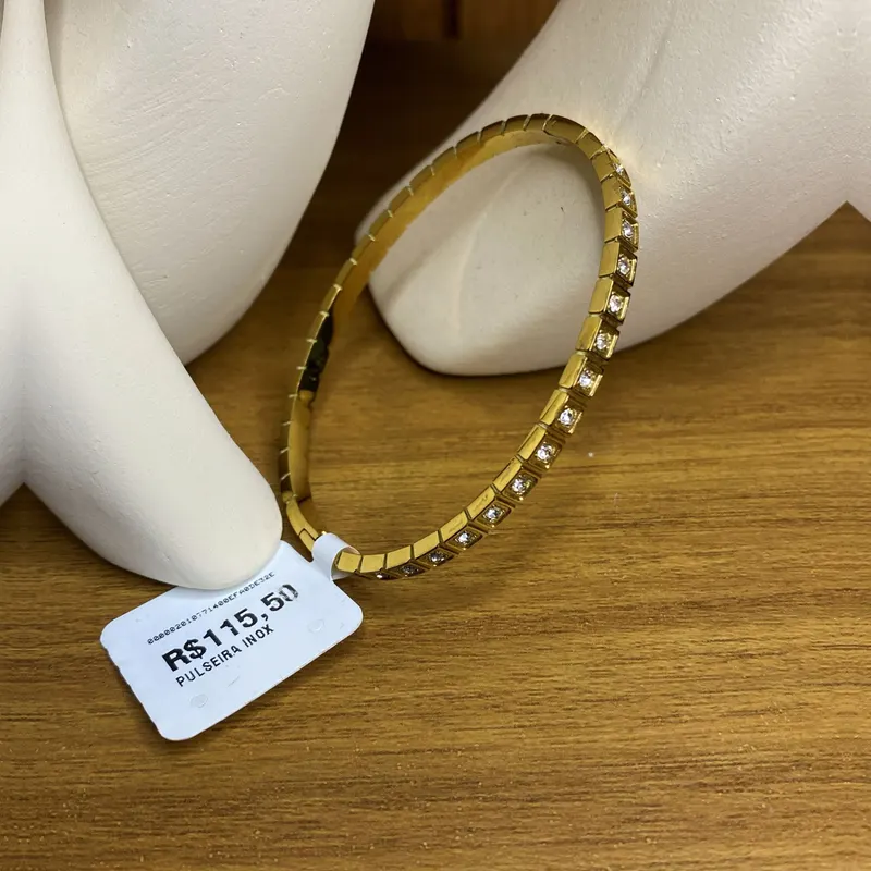 Bracelete dourado com zircônias