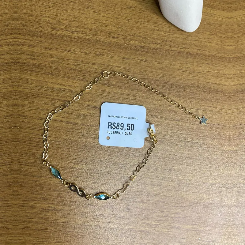 Pulseira infinito com pedras azuis