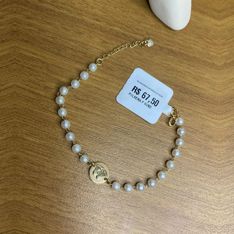 Pulseira pérolas com medalha