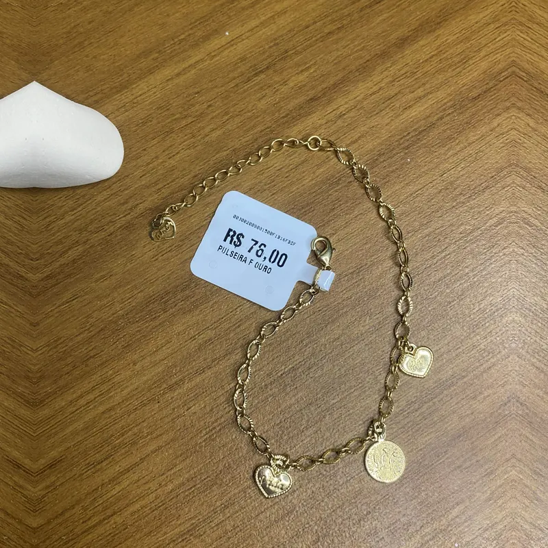 Pulseira com medalhas e coração